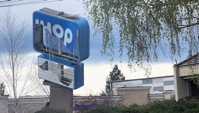 Bend’s well-known IHOP sign almost taken out in early-AM crash; minor injuries to driver, 80, who was cited by police