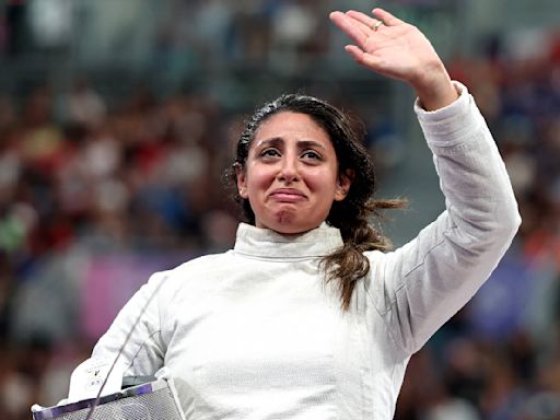 I'm Obsessed With This Egyptian Olympic Fencer Competing At The Olympics While Seven Months Pregnant