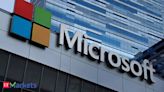 Microsoft sinks, chipmakers climb as AI rally faces divide - The Economic Times