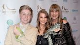 Bindi Irwin’s Daughter Grace Carries an Animal-Print Block on a Family Getaway & The Video Is Adorable