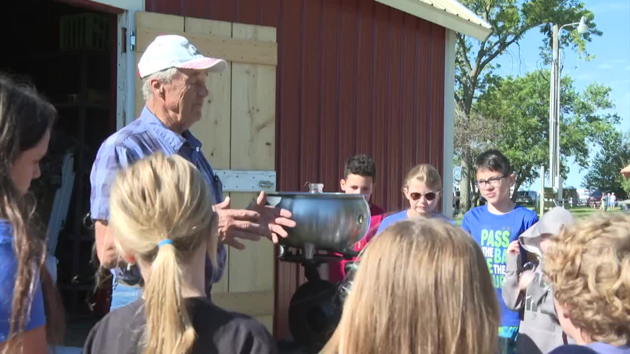 Farmers teach students about agriculture history in Iowa