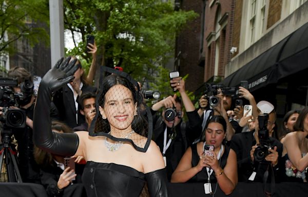 Rosalía Is Funeral-Chic in a Jet-Black Look and Lace Veil at the Met Gala