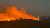 Air tankers and helicopters attack Arizona wildfire that has forced evacuations near Phoenix