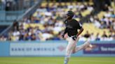 Miami Marlins hit five home runs to rout Los Angeles Dodgers in series opener