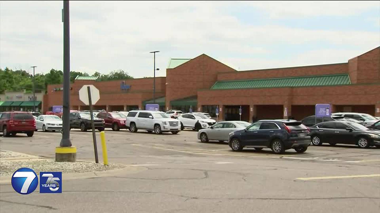 Worker injured in armed robbery at Kroger; Person of interest in custody