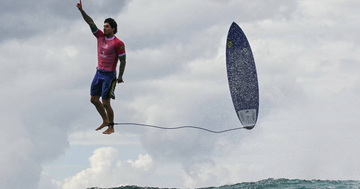 Right place, right time: The story behind the viral surfing photo from the Paris Olympics