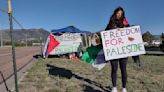 Protesters gather outside of Air Force Academy, briefly shut down road, during Thursday's graduation