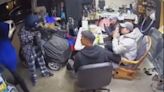 ‘It was very frightening’: New video shows masked men robbing Tacoma residents in garage at gunpoint