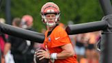 Joe Burrow leaves practice on a cart after apparent leg injury