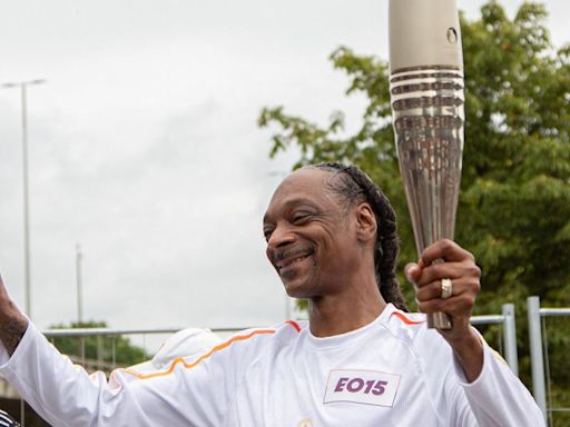 Snoop Dogg Carries Olympic Torch In Paris, Sets Internet Ablaze With Memes