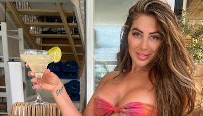 Chloe Ferry flaunts her curves in a tiny bandeau bikini on holiday