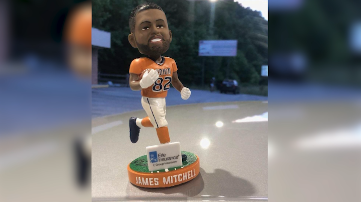 Axmen honor Mitchell with bobblehead night