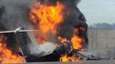 Plane crash lands on Florida highway and bursts into flames