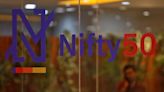 Banks power Indian shares amid earnings rush, global rebound