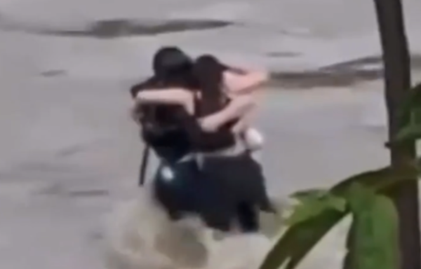 Italy floods: Heartbreaking footage of three friends hugging before being swept away