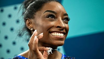 Simone Biles wore a goat necklace encrusted with 546 diamonds while accepting her gold medal at the Paris Olympics