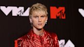 Machine Gun Kelly's major tooth transformation as he debuts fangs