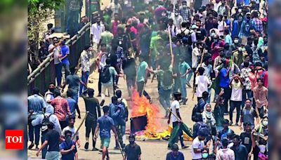 32 die in Bangladesh unrest; state TV building set afire - Times of India