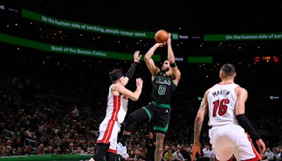 Jayson Tatum, Celtics Eliminate Heat from NBA Playoffs as Fans Debate Title Candidacy