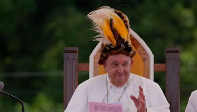 Pope arrives in remote Papua New Guinea jungle with humanitarian aid and toys