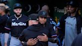 A handful of disgruntled Marlins fans protest the team following the Luis Arraez trade