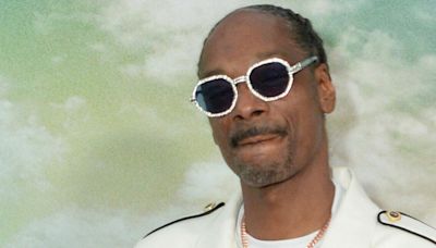 Snoop Dogg's Olympic Torch Post Sparks Viral Cannabis Memes