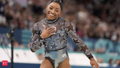 Simone Biles shakes off a calf injury to dominate during Olympic gymnastics qualifying