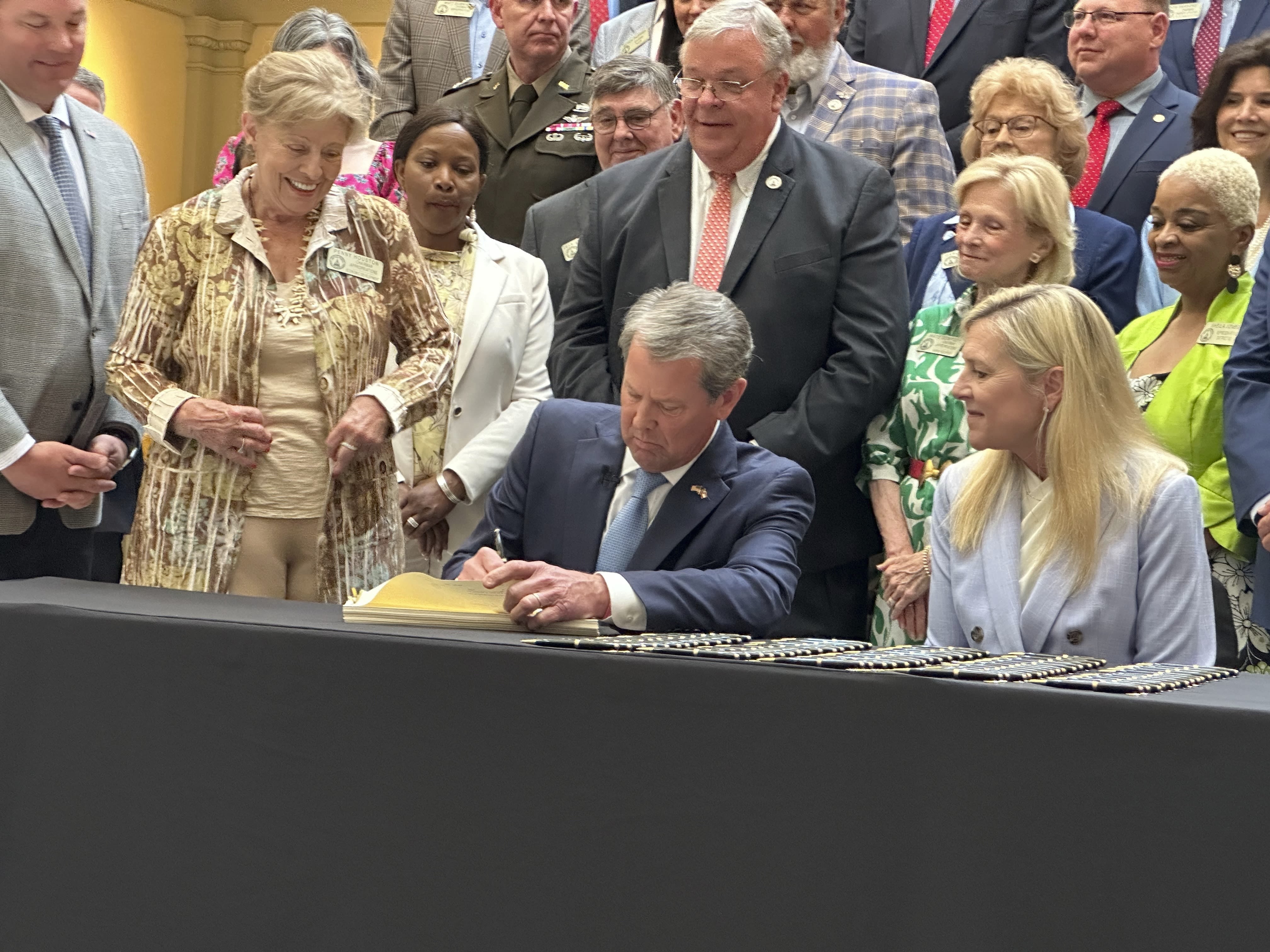 Georgia governor signs budget boosting spending, looking to surplus billions to cut taxes in future