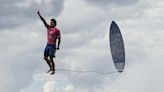 Brazil's gravity-defying surfer Gabriel Medina and other Paris Olympics photos from Monday and Tuesday