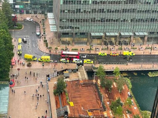 'Get out as quick as you can': Canary Wharf tube station evacuated by police following incident