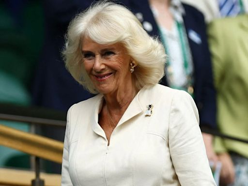 Queen Camilla looks radiant in cream dress in surprise Wimbledon appearance