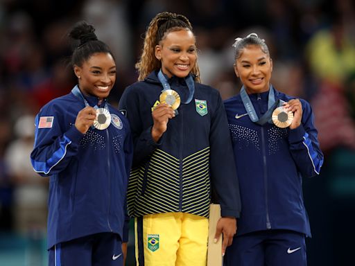 6 photos of Simone Biles and Jordan Chiles bowing down to Rebeca Andrade after her gold medal win