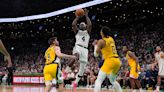 Celtics guard Jrue Holiday flexes his offensive muscle