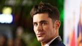 Yeah, Zac Efron's mom was wondering what was going on with his jawline, too