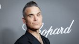 Robbie Williams says he is going through ‘manopause’ after years of partying