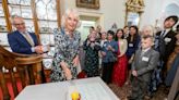 Swindon volunteers attend reception with the Queen