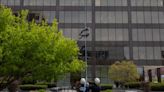 Grand Rapids Fire Department rescue personnel rappel down City Hall in rope rescue training course