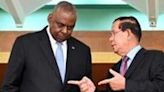 Defense Secretary Lloyd Austin (L with Cambodia's long-serving former prime minister Hun Sen) is looking to reset Washington's ties with China ally Phnom Penh