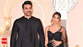 Arbaaz Khan and wife Sshura Khan hold hands while posing for paparazzi in their twinning black outfits at Anant Ambani-Radhika Merchant’s wedding - See photos | - Times of India