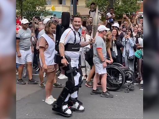 Paralyzed Tennis Player Carries Olympic Torch Using Robotic Exoskeleton