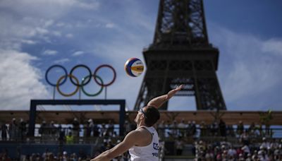 At the Olympic beach volleyball venue, the Eiffel Tower stars in a très French show