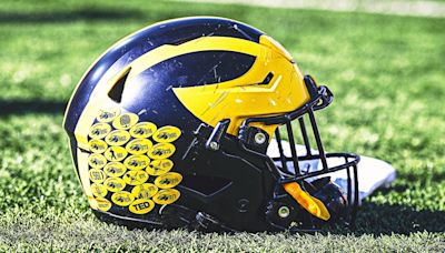 Michigan gets three years probation for football recruiting violations