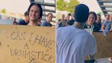 Travis Barker Gives Fan Drumsticks After Spotting Homemade Sign Outside of Concert