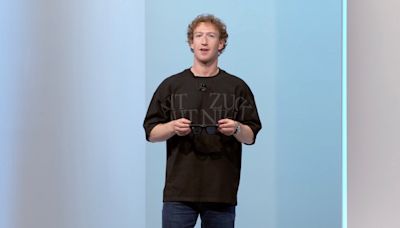 What does Mark Zuckerberg's shirt say?