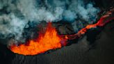 What causes volcanoes to erupt?