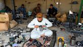 Afghans hunt for gold at the end of the radio