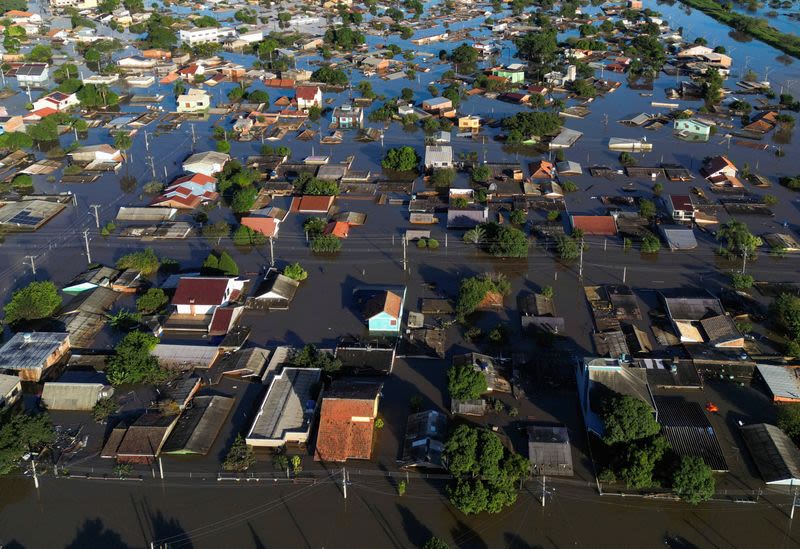 Deaths in Brazil floods rise to 107, horse rescued from rooftop