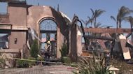 'Devastating' wildfire destroys California mansions