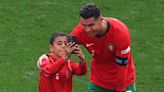 Cristiano Ronaldo poses for selfie with Euro 2024 pitch invader