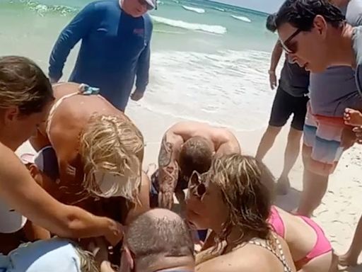 Red flags: Beachgoers saved one Florida shark attack victim. Then came a second attack